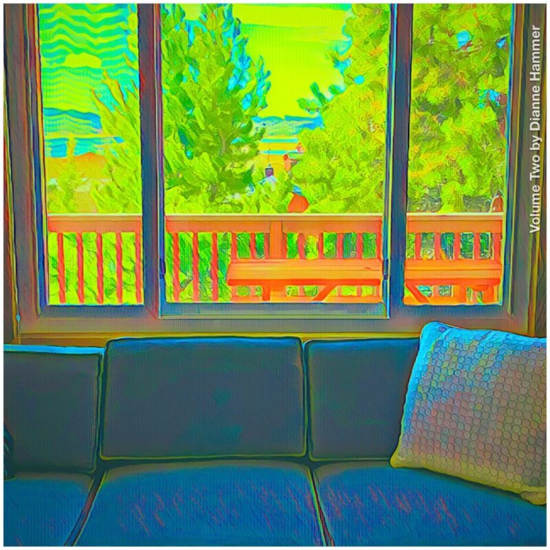 Digital art of blue couch with throw pillow at one end, in front of a large window with a view of a deck, pine trees and a lake and mountains beyond.